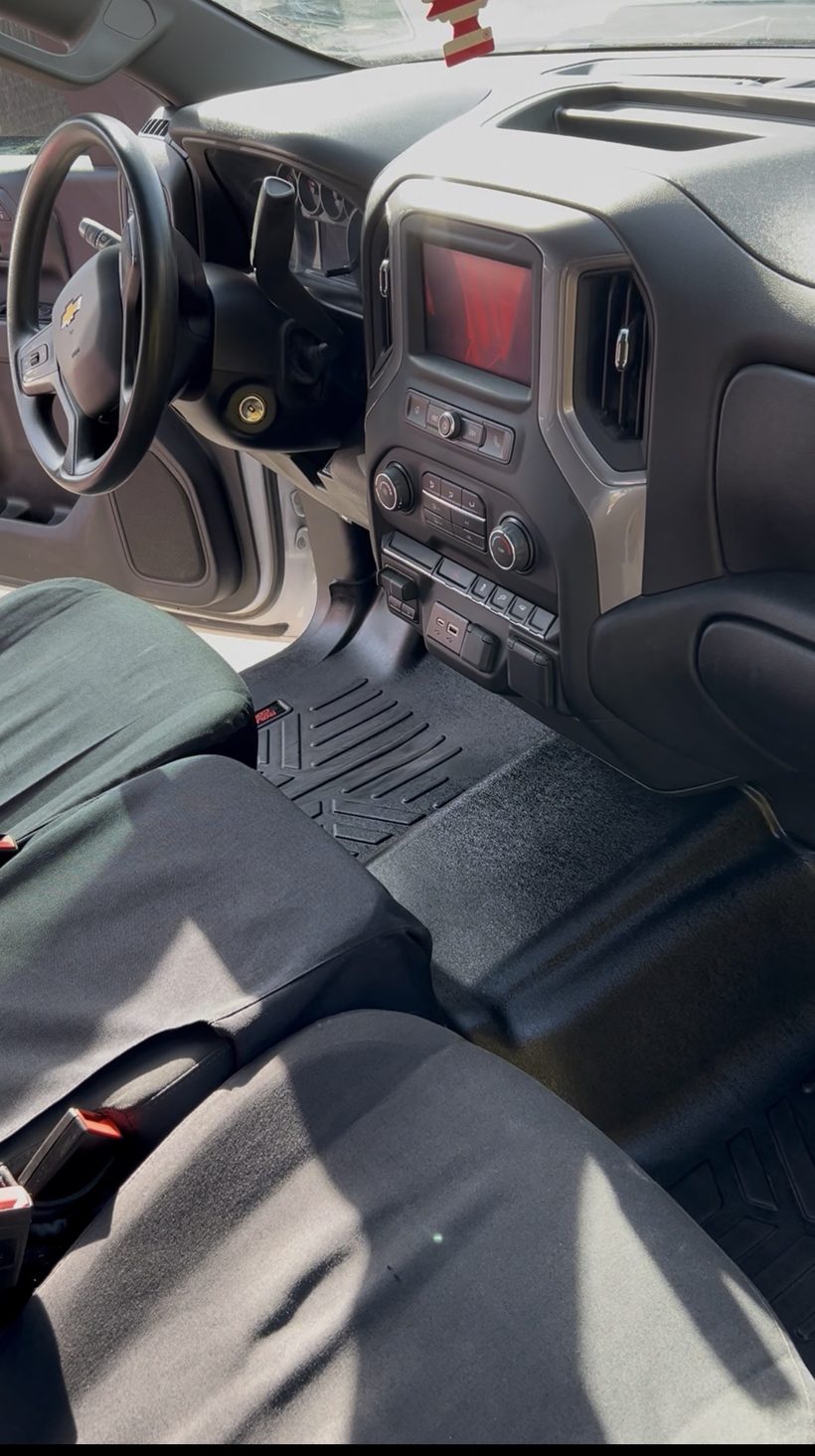 Truck cabin after detailing — clean floor mats