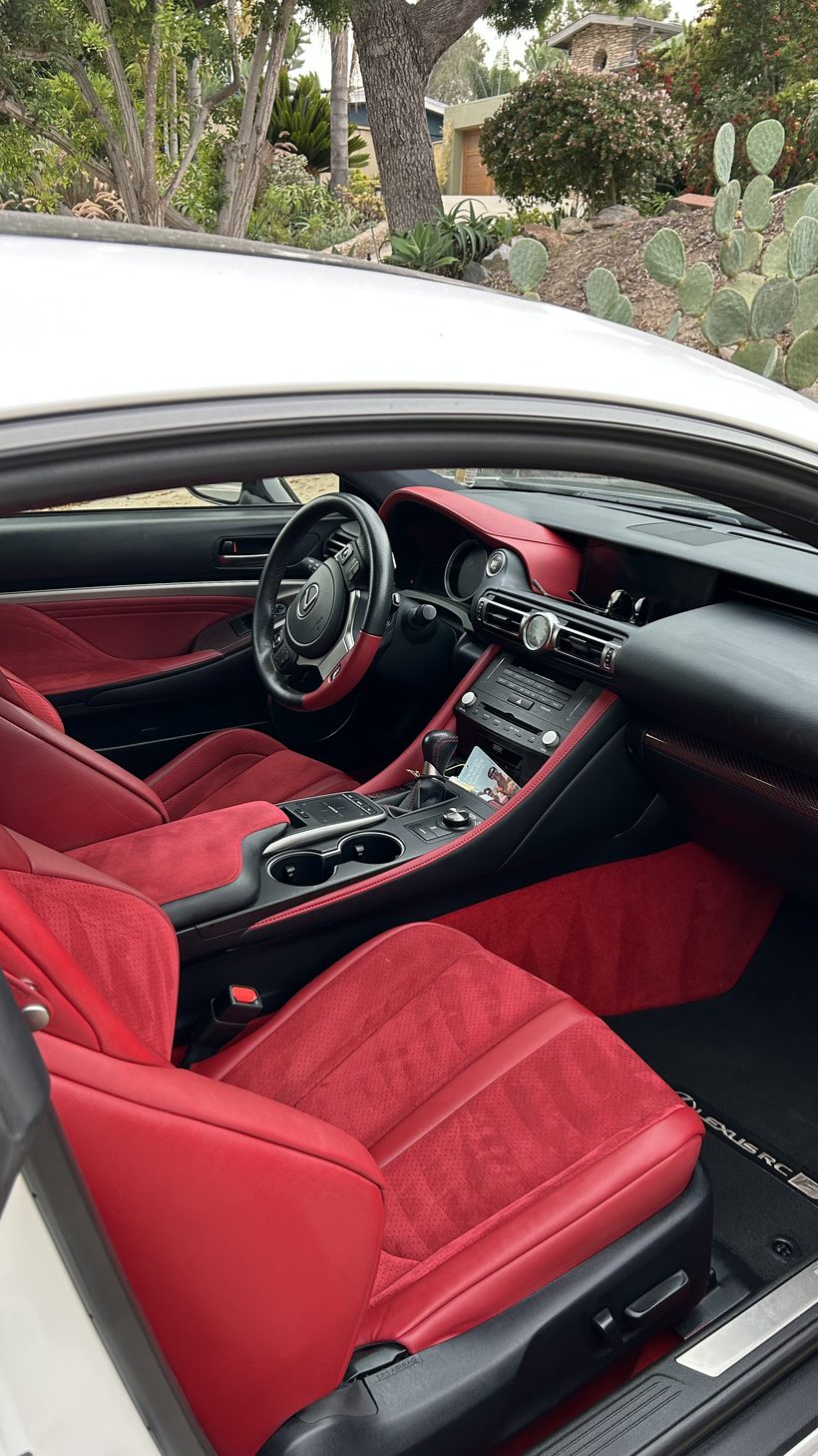 Finished sports car interior with red leather